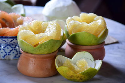 Close-up of fruits in plate on table