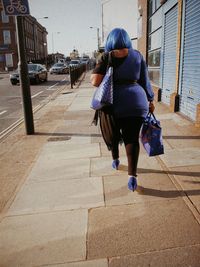 Full length of woman standing in park