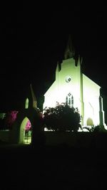 Low angle view of illuminated built structure