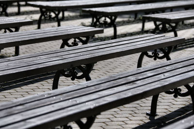 High angle view of empty benches at park