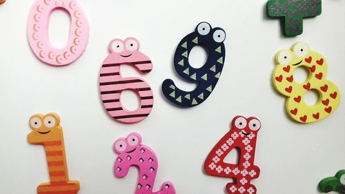 Close-up of multi colored buttons on table