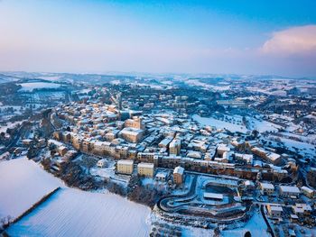 High angle view of buildings in city during winter