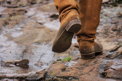 Low section of man standing outdoors