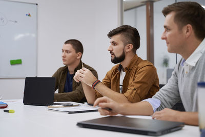 Business colleagues working at office