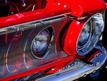 Close-up of red vintage car