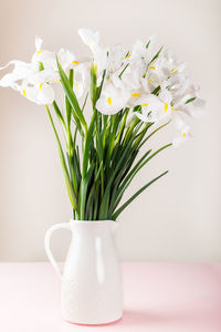 Close-up of white flower vase on table