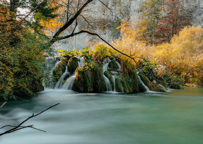 Long exposure photo of amazing waterfalls and cascades in autumn