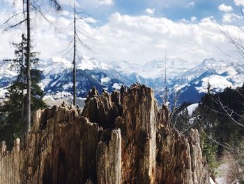 Panoramic view of snowcapped mountains against sky