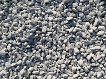 High angle view of stones on pebbles