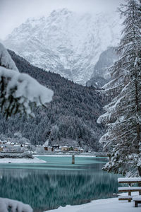 Scenic view of snowcapped mountains and lake