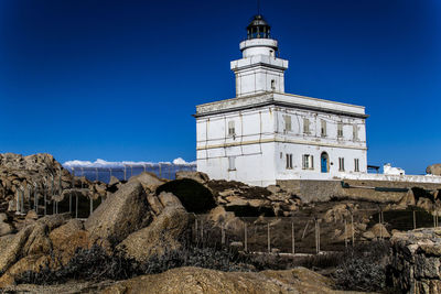 Low angle view of historical building against blue sky