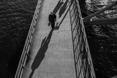 High angle view of men on bridge