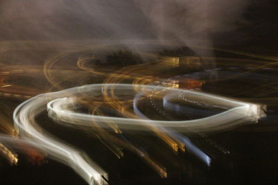 Digital composite image of light trails at night