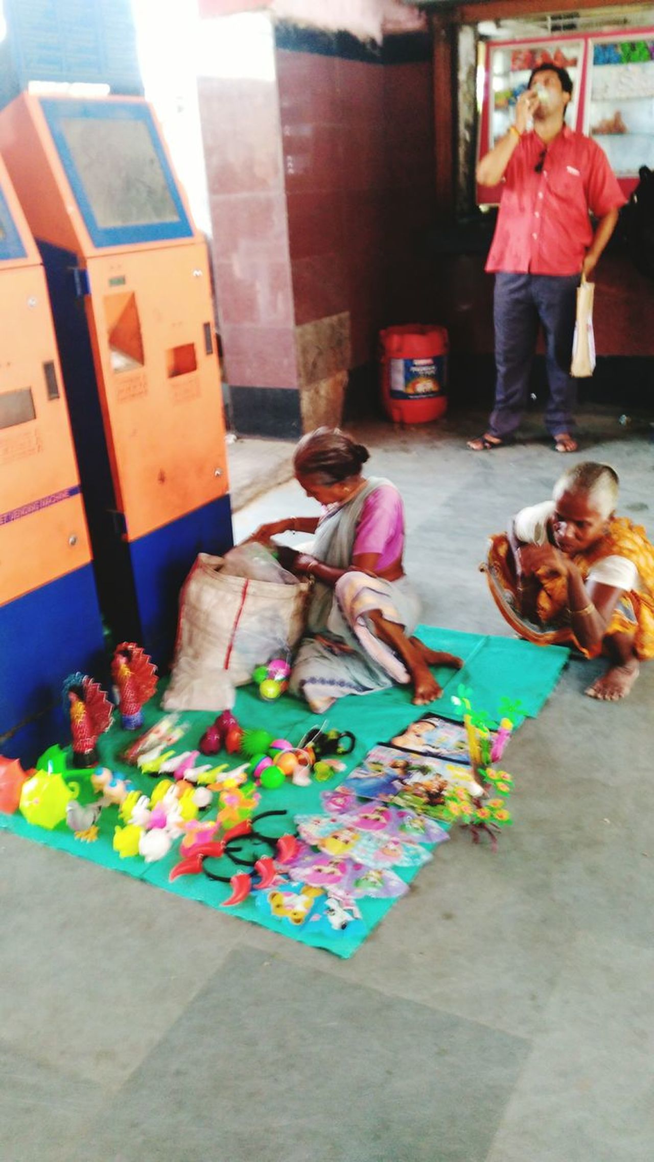 Two older Woman Selling Toys