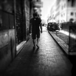 Full length of woman walking in city