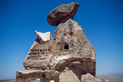 Old town of uchisar in turkey houses and the fortress in the summer in sunny weather