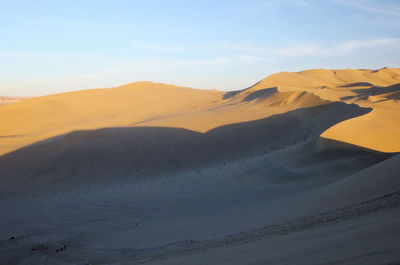 Scenic view of desert against sky