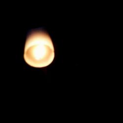 Close-up of illuminated moon against black background