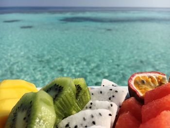 Close-up of fruit at beach