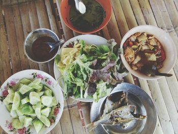 High angle view of vegetables in plate on table