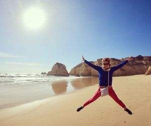 Full length of man on beach against sky