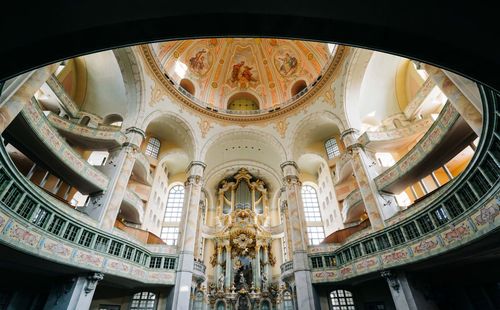 Hugh organ in the middle of a colorful church