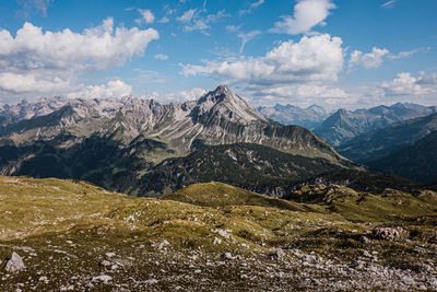 Scenic view of mountains against sky in kleinwalsertal.