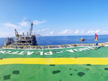 Scenic view of sea against blue sky