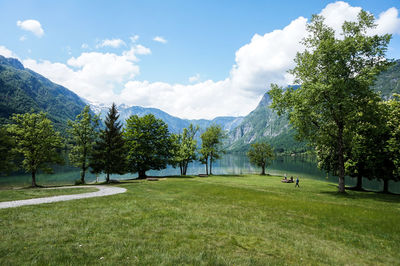 Scenic view of golf course against sky