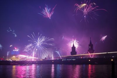 View of firework display in city