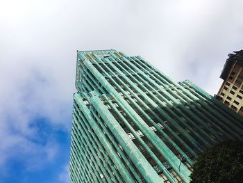 Low angle view of modern buildings against sky