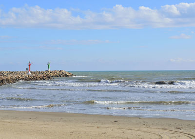 Scenic view of beach against sky