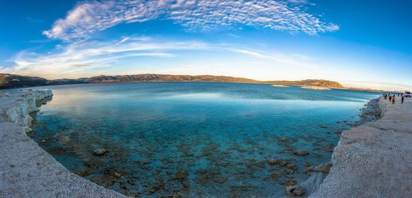 View of lake against cloudy sky