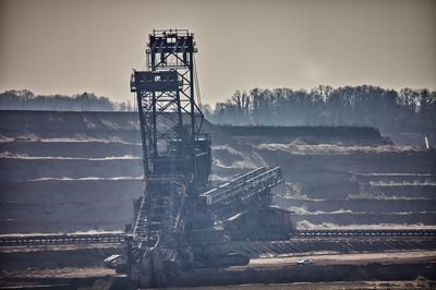 Metallic structure in coal mining against sky