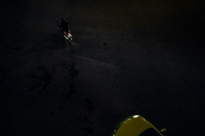 High angle view of man skateboarding on road