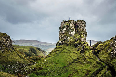 Low angle view of castle on cliff against sky