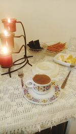 Close-up of coffee served on table