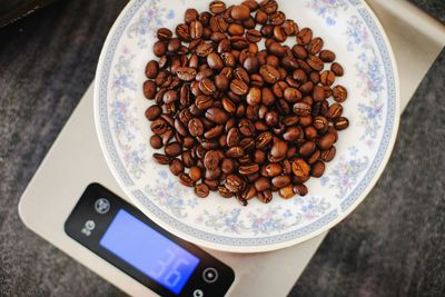 High angle view of coffee in plate on table