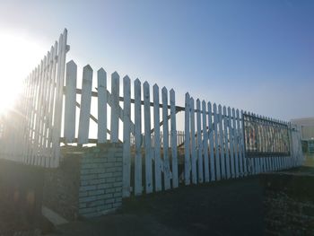 Fence against clear sky