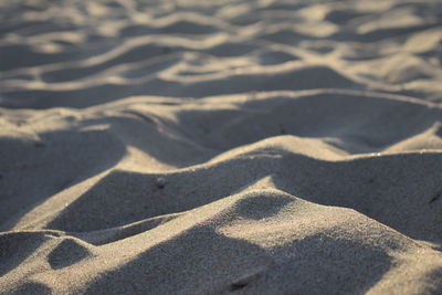 High angle view of shadow on sand
