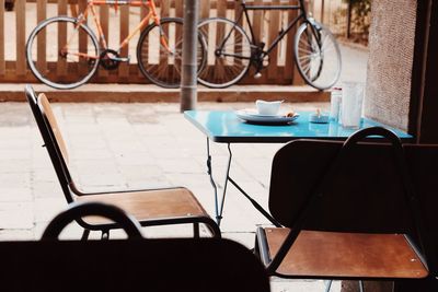 Empty chairs and table in restaurant