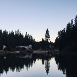 Scenic view of calm lake against clear sky