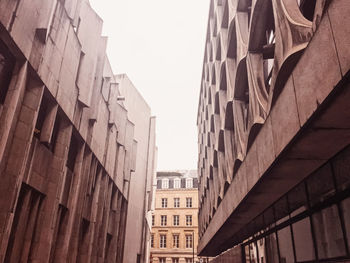 Low angle view of buildings against clear sky