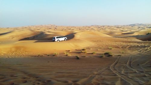 Scenic view of desert against sky