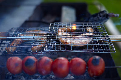 Close-up of meat on barbecue grill