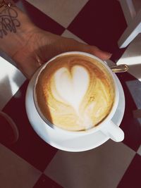 Close-up of cappuccino on table