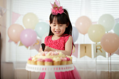 Portrait of a girl with balloons