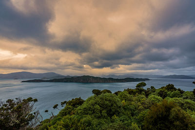 Scenic view of sea against sky at sunset