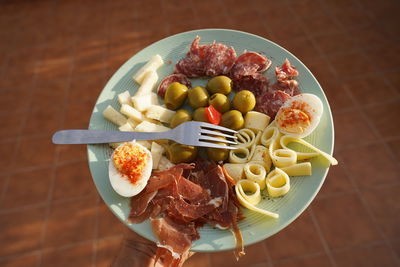 High angle view of breakfast served on table