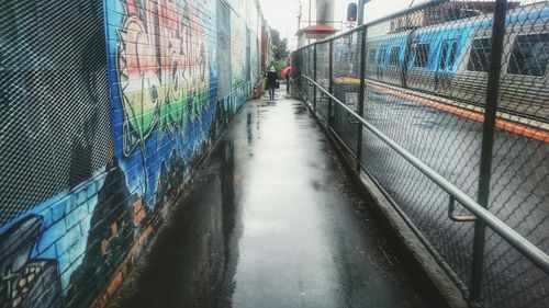 Narrow walkway in city